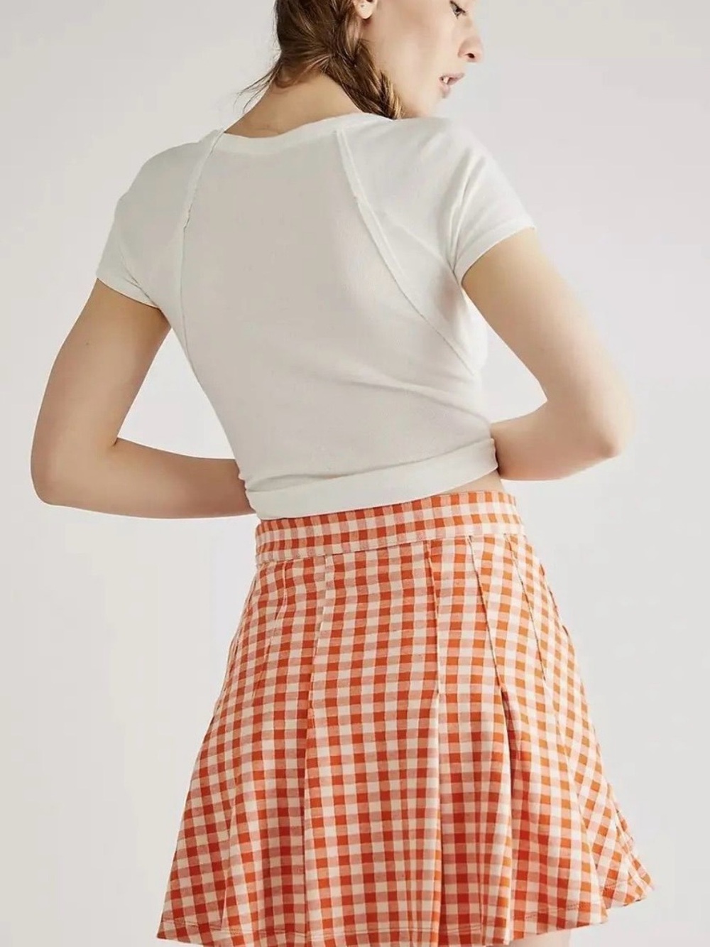 (10) $98.00 MSRP Free People
Gingham Pleated Mini Skirt - Orange & White